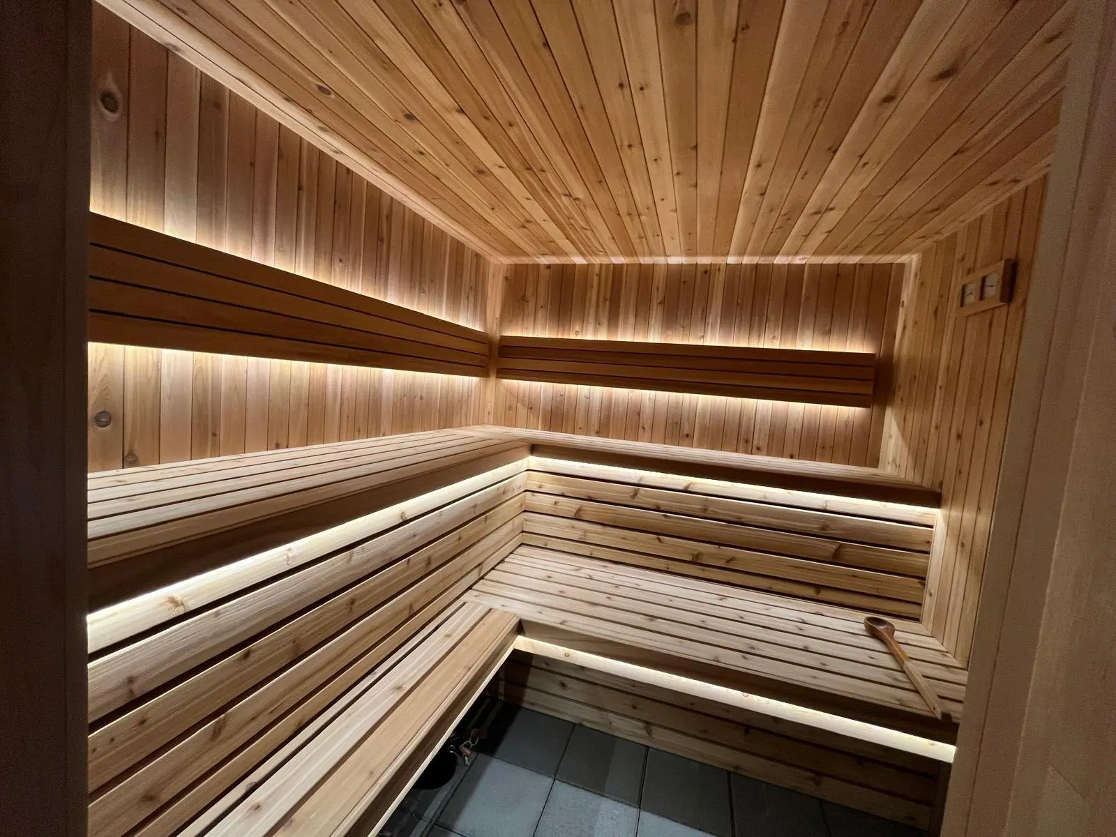Cube interior with cedar benches and LED lighting