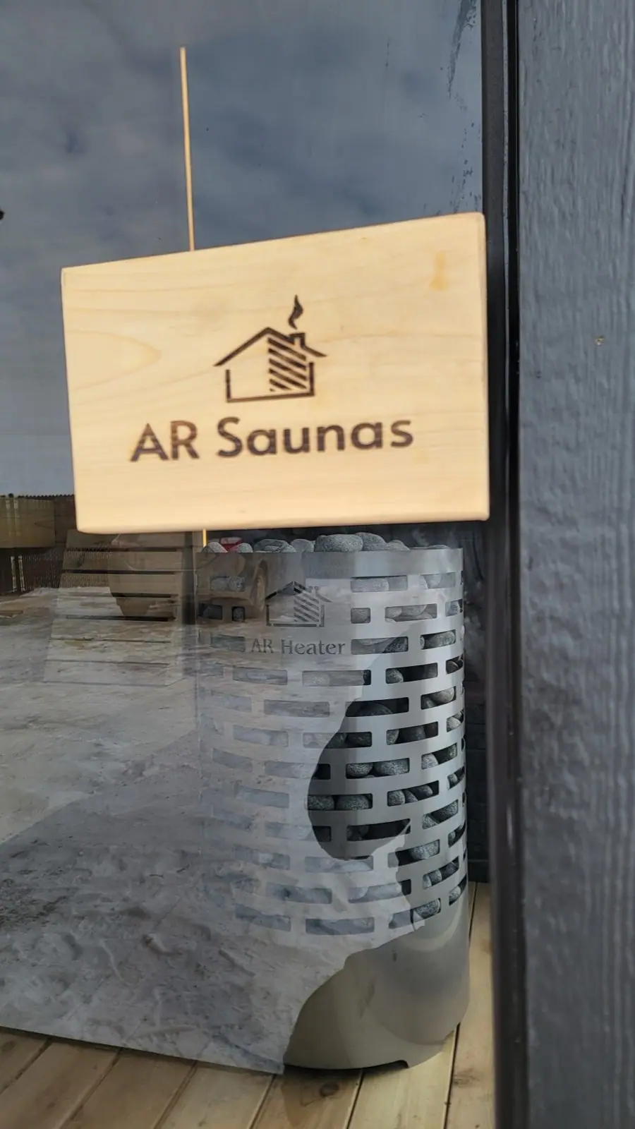 AR Saunas showroom sign and heater