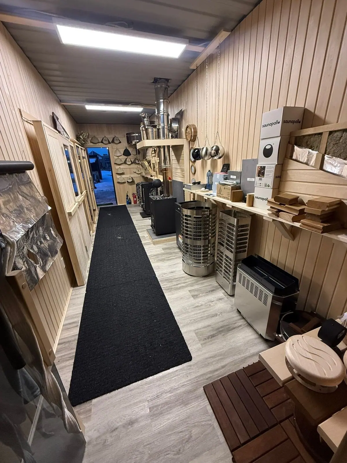Showroom aisle with heaters and accessories