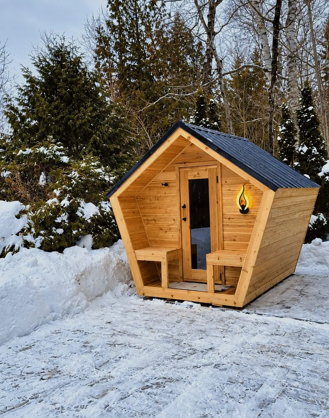 Cedar pentagon sauna in the snow