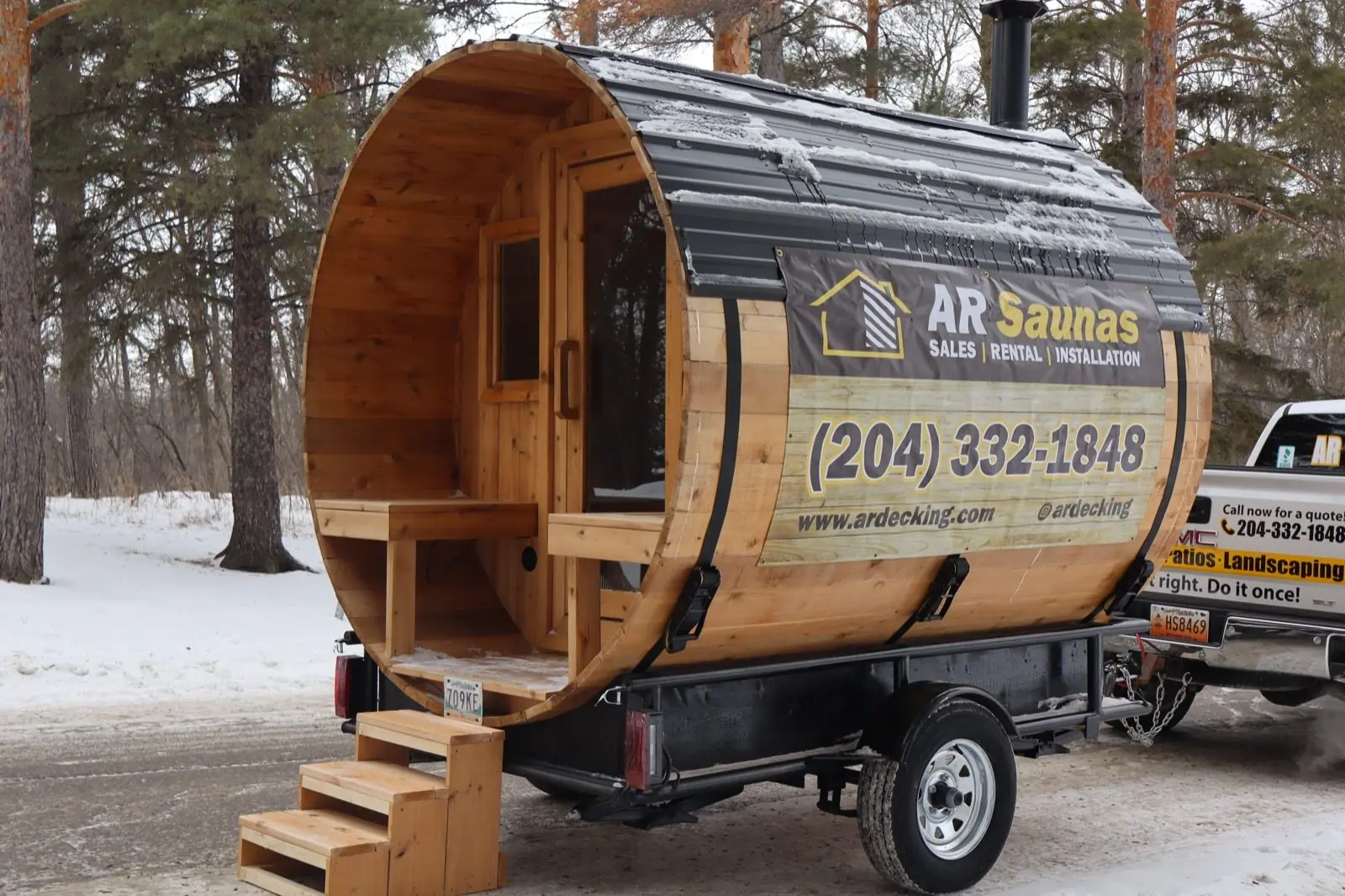 Wood-fired barrel sauna rental delivered in winter