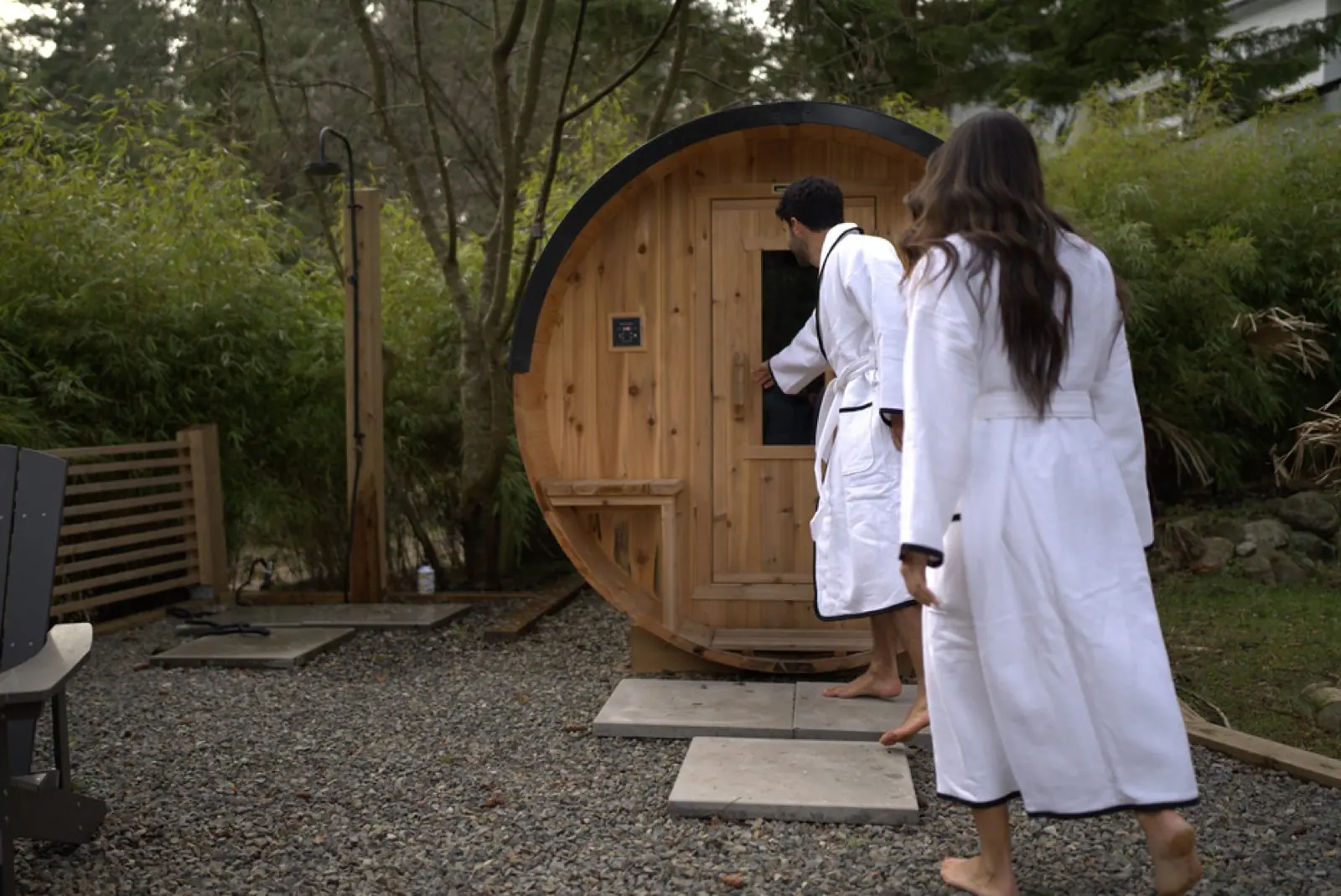 Stepping into a barrel sauna